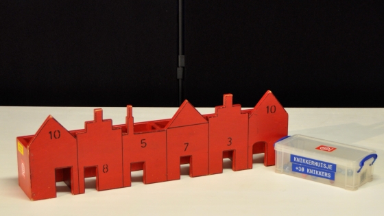 Volksspel knikkerhuisje